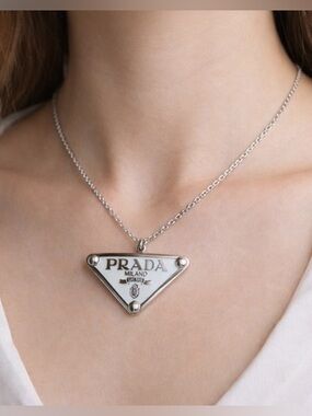 Prada stamped luxury White and Silver pendant charm/ zipper pull - NEW